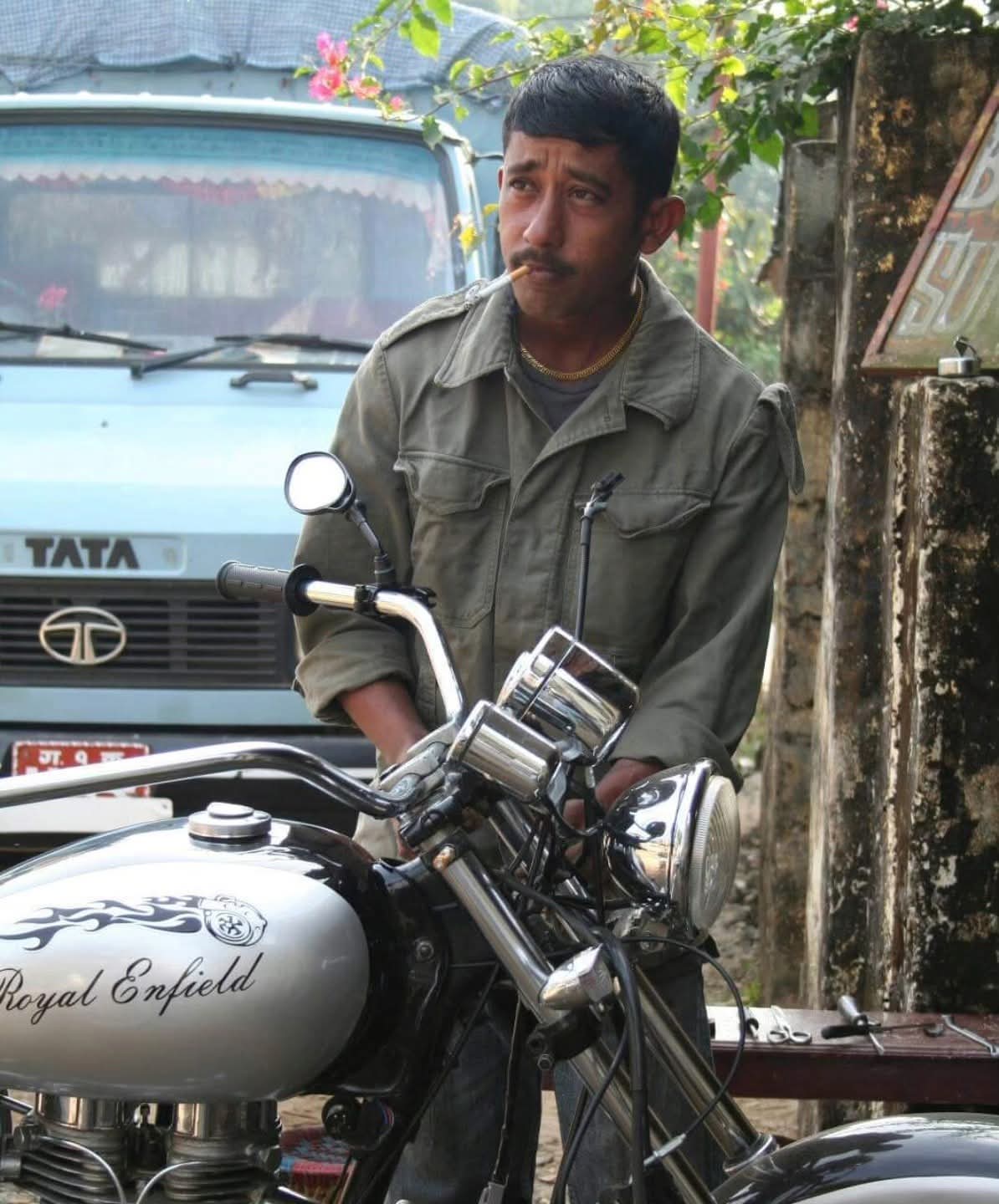 Raju Kunwar working on a Royal Enfield